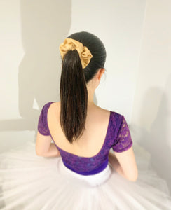 Ballerina wearing a Silk hair scrunchie
